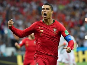 Cristiano Ronaldo scoring a goal against Spain in FIFA World Cup 2018 held at Russia.